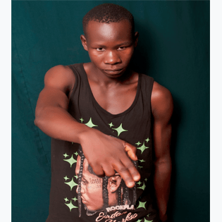 Portrait of Ham Prince, Teso music artist blending traditional sounds with Afrobeats