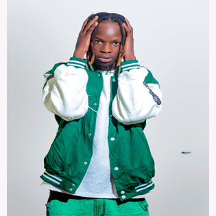 City Error, a Ugandan artist/singer performing a high-energy track on stage