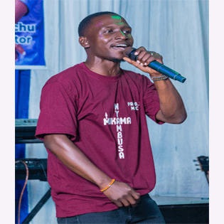 papa OJ, Teso gospel artist from Uganda leading a worship session