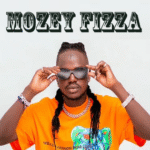 Mozey Fizza, recording and performing artist from Karamoja, Uganda, posing confidently in a vibrant outfit