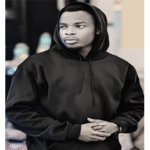 Gospel artist Minister Immanuel featured on Teso Music, promoting his latest inspirational track with a faith-themed design.