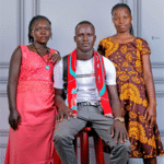 Brother Julius and Mama Bukedea Lea performing a heartfelt gospel song, promoting faith and divine wisdom through music