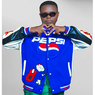 Sunny Bright P posing in studio – Ugandan artist blending traditional and urban sounds