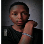 Vicxtar Brown posing in stylish Afrobeat fashion to promote his new Ugandan hit song