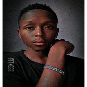 Vicxtar Brown posing in stylish Afrobeat fashion to promote his new Ugandan hit song