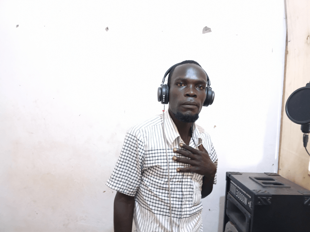 Gospel artist Opade Aburam in a professional promotional portrait, reflecting faith and inspiration